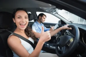 young-woman-getting-driving-lesson-600nw-254335081